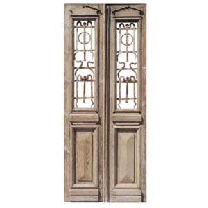 Pair of Salvaged 40” French Colonial Doors with Iron Inserts