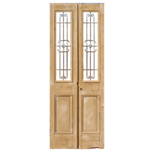 Pair of 36” Reclaimed French Colonial Doors with Iron Inserts, Late 19th Century